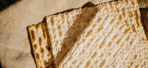 Close-up view of traditional matzah used during Passover celebrations.